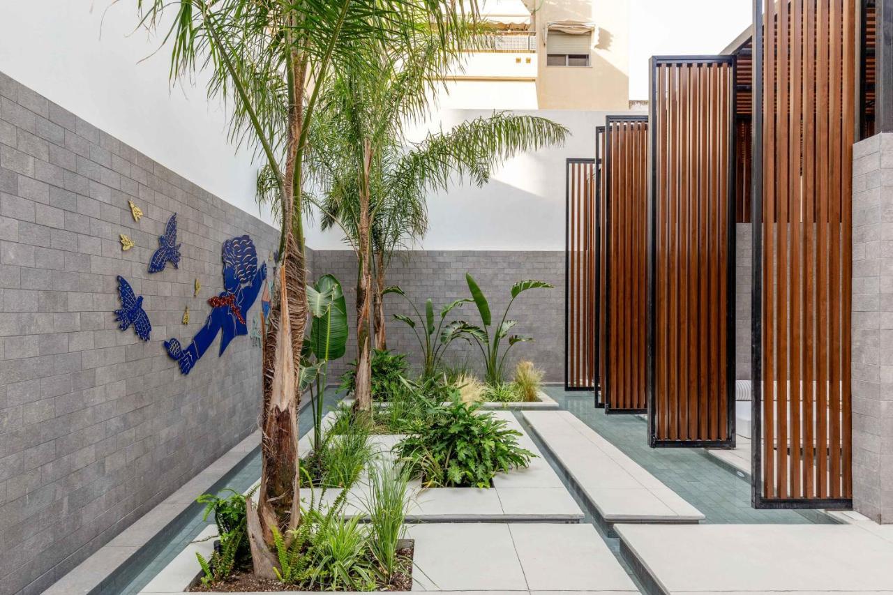 The Newel Psychiko Hotel เอเธนส์ ภายนอก รูปภาพ The courtyard of the museum
