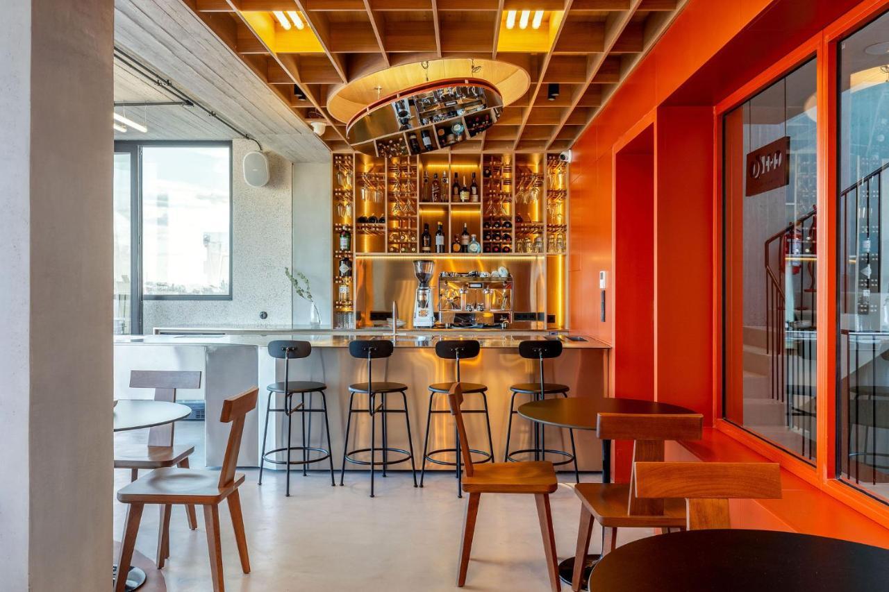 The Newel Psychiko Hotel เอเธนส์ ภายนอก รูปภาพ The interior of a Starbucks Reserve store in Milan, Italy