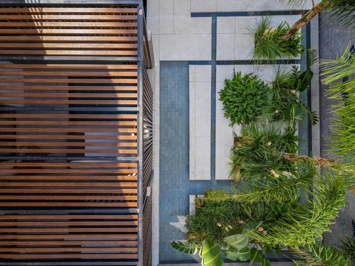 The Newel Psychiko Hotel เอเธนส์ ภายนอก รูปภาพ The courtyard of the house